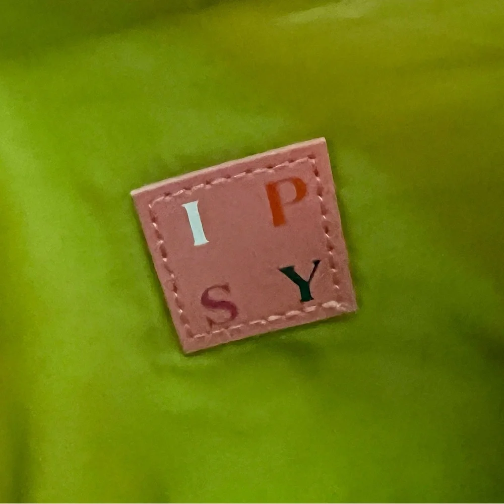 IPSY Envelope Accessory Bag Embossed Cream and Green with Snap Closure.